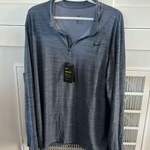 NIKE. Men’s, blue w/ subtle stripes & black NIKE check, pullover. NWT.